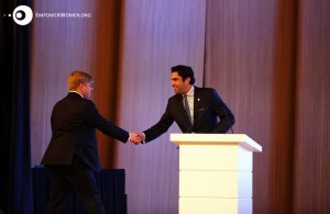 Andreas from our team walking on stage to take over the lead facilitation. Photo by Emad Karim.